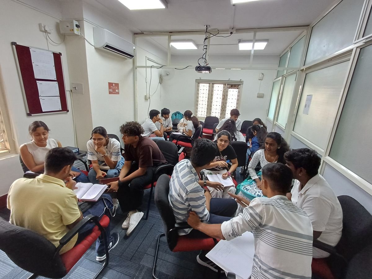 Participants working in small groups during a Protocol class